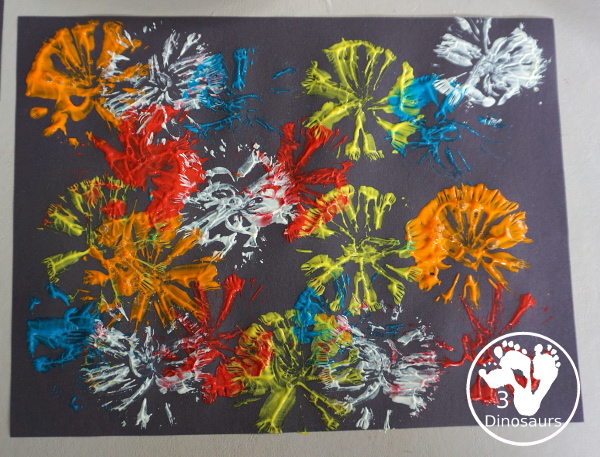 Firework Painting with String Balls - with a simple rubber band string ball painting with different colors and great for the Fourth of July and any Firework themes. And also works for the Opening Ceremony for the Olympics