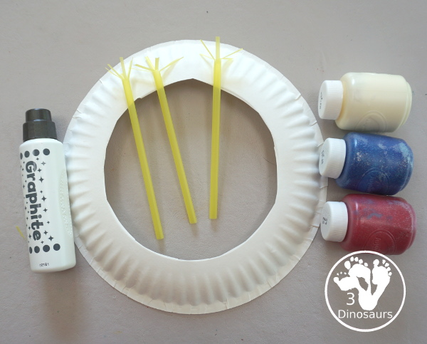 Red, White & Blue Straw Painted Fireworks Wreath - a fun firework themed wreath for the Fourth of July with red, white, and blue colors. A simple painting craft you can do with kids. - 3Dinosaurs.com