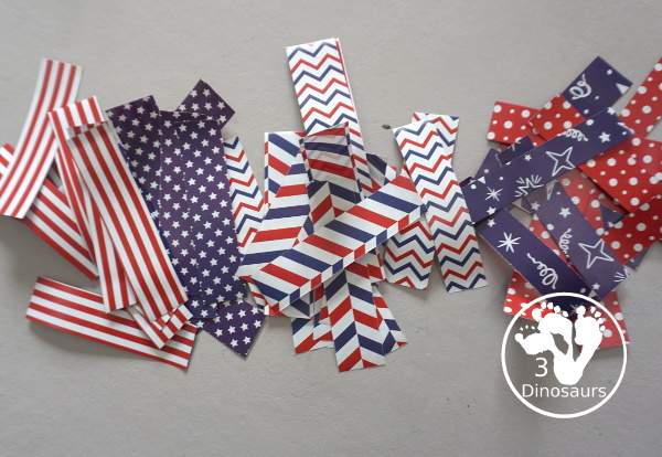 Red White and Blue Wreath Craft - a fun wreath craft made with scrapbook or any type Fourth of July paper with the red and blue themed paper around the paper plate. A simple craft you can do with preschool, prek and kindergarten age kids. - 3Dinosaurs.com
