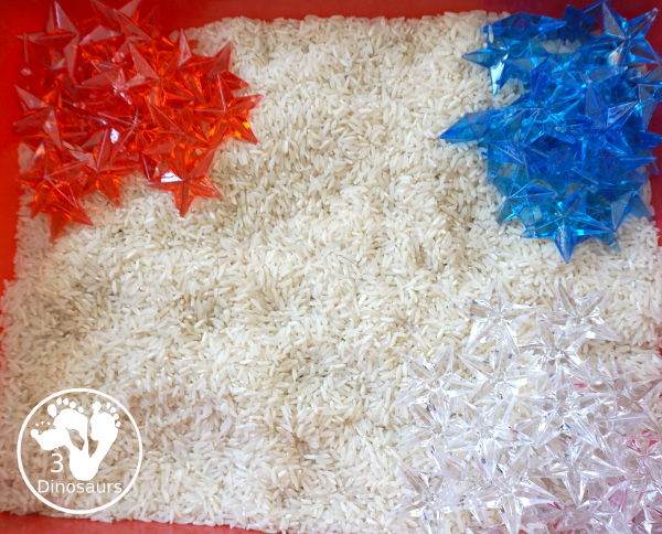 Red, White & Blue Star Sensory Bin for the Fourth of July - A simple sensory bin with red, white and blue stars with a rice filler. A great way to work on color for the 4th of July with kids in preschool, prek and kindergarten - 3Dinosaurs.com