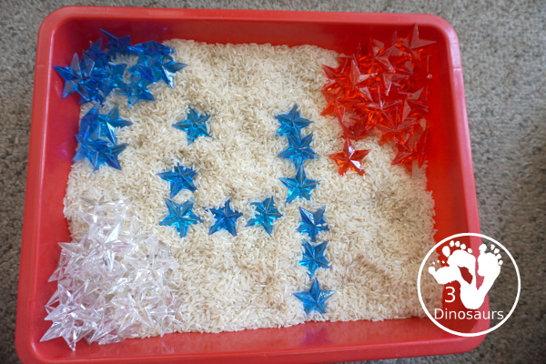 Red, White & Blue Star Sensory Bin for the Fourth of July - A simple sensory bin with red, white and blue stars with a rice filler. A great way to work on color for the 4th of July with kids in preschool, prek and kindergarten - 3Dinosaurs.com