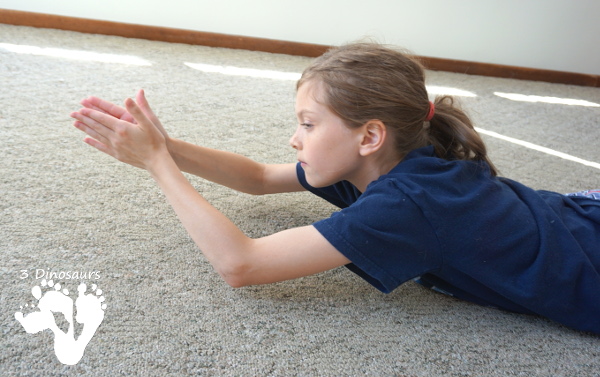 4 Gross Motor Activities on  Your Stomach - a great way to work on building stomach gross motor skills and having fun - 3Dinosaurs.com