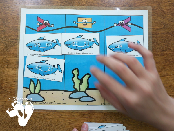 Free Shark Themed Greater Than - Less Than Sorting - with math sharks and recording sheet with 4 levels of sharks: numbers, addition, double digits and multiplication - 3Dinosaurs.com