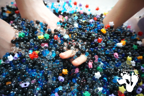 Star Themed Water Bead Sensory Bin - simple to make and play in with loads of space-themed fun for kids  - 3Dinosaurs.com