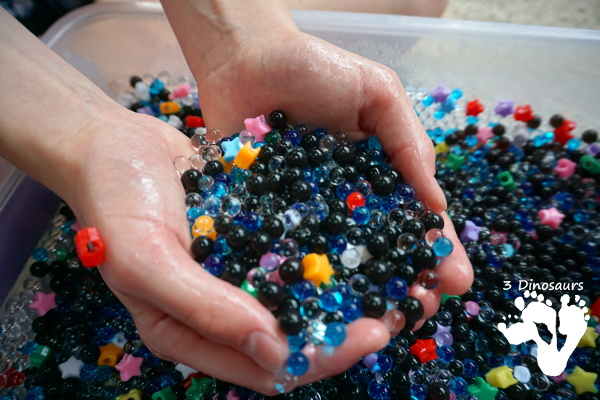 Star Themed Water Bead Sensory Bin - simple to make and play in with loads of space-themed fun for kids  - 3Dinosaurs.com