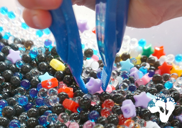 Star Themed Water Bead Sensory Bin - simple to make and play in with loads of space-themed fun for kids  - 3Dinosaurs.com