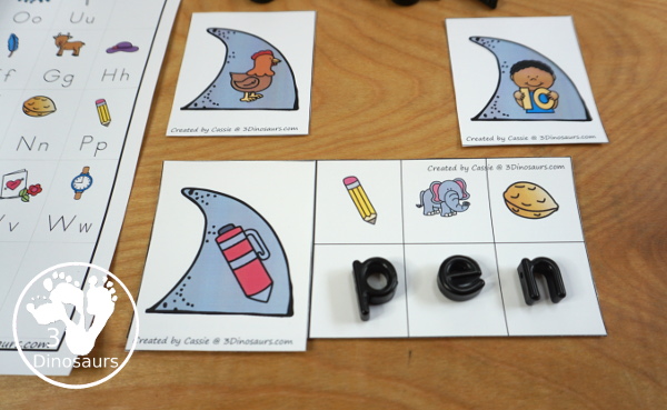 Free Shark Fin Decoding CVC Words - it works on -an, -en, -in and -un words with decode the word and find the matching picture - 3Dinosaurs.com