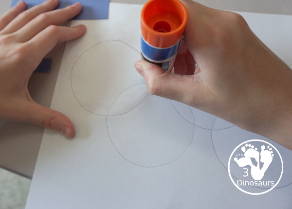 Torn Paper Olympic Rings Craft - is a simple and easy craft that kids can make for the Olympics with torn paper to make the rings. - 3Dinosaurs.com