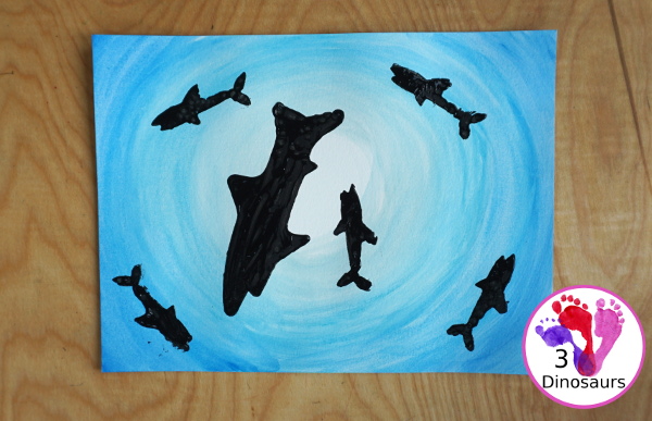 Shark Cookie Cutter Painting with Q-tip & Watercolors - a fun painting activity that kids of different ages can do. It is a fun way to work on colors and fine motor painting with q-tips and watercolors - 3Dinosaurs.com