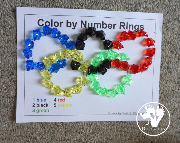 Olympic Flag Colors Sensory Bin - a simple sensory bin to explore the different colors that make the rings on the Olympic Flag - 3Dinosaurs.com