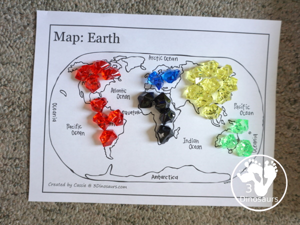 Olympic Flag Colors Sensory Bin - a simple sensory bin to explore the different colors that make the rings on the Olympic Flag - 3Dinosaurs.com