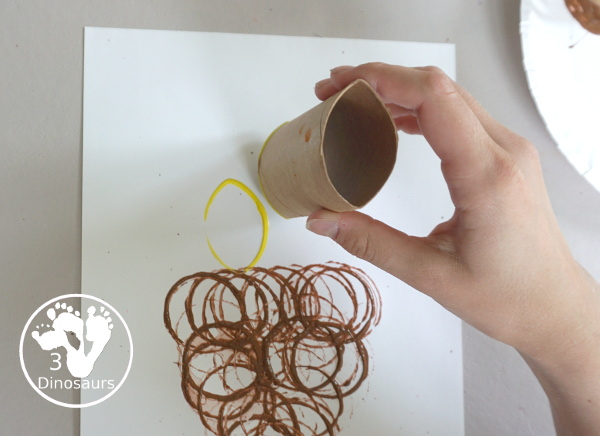 Paper Roll Torch Painting - a simple painting made with paper rolls and paint to make a Torch for the Olympics - 3Dinosaurs.com