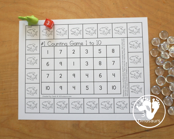 Free Shark Number Counting Game Printables - you have two number games that work on numbers from 1 to 10. You have a shark number word game and a shark numerical number game. Both fun ways to work on counting and numbers with a fun shark theme. - 3Dinosaurs.com