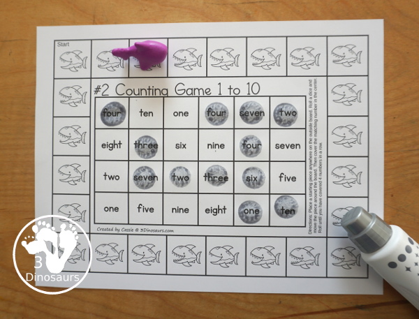 Free Shark Number Counting Game Printables - you have two number games that work on numbers from 1 to 10. You have a shark number word game and a shark numerical number game. Both fun ways to work on counting and numbers with a fun shark theme. - 3Dinosaurs.com