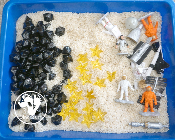 Space Sensory Bin With Rice and Rocks - you have space figures, yellow stars, and rice for this simple sensory b8in. This is great for a space theme with kids. And they will enjoy exploring space themes in the sensory bin. A fun sensory bin for kids in preschool, prek and kindergarten. - 3Dinosaurs.com