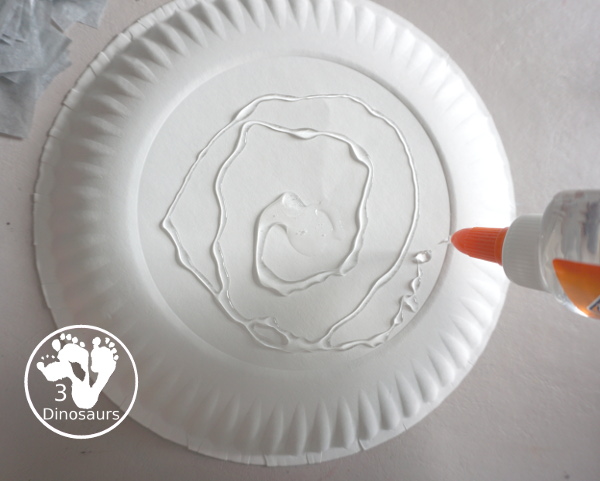 Tissue Paper Moon Paper Plate Craft - a fun tissue paper craft that kids can make for a moon theme. A fun way to make a moon with kids for Moon Day in July or any Moon theme. They will enjoy it. 3Dinosaurs.com