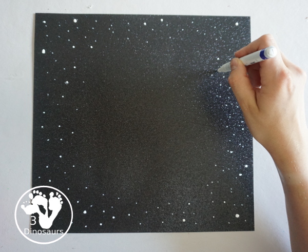 Yarn Moon Craft For Kids is simple to make with a paper plate, glue and yarn to make the moon. It is great for Moon Day or any moon theme you do with kids. - 3Dinosaurs.com