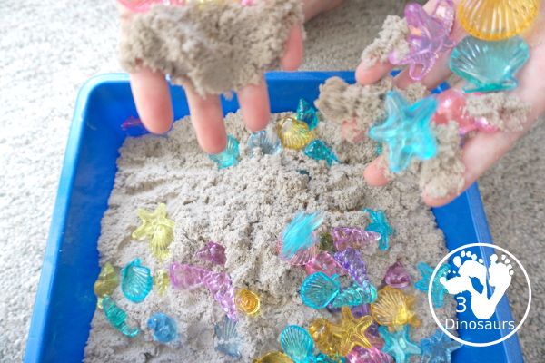 Beach Kinetic Sand & Shell Sensory Bin - for an easy to set up sensory play that kids can do any time of the year and work great for a beach theme day - 3Dinosaurs.com