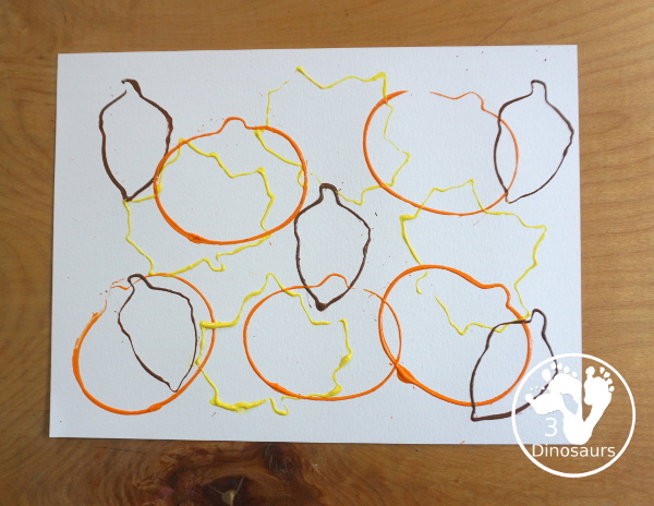 Fall Cookie Cutter Painting - with  acorns, pumpkins and a leaf. Great fun theme for fall! A great painting idea for preschool and prek. 3Dinosaurs.com
