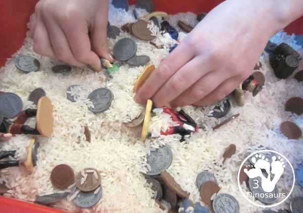 Pirate Sensory Bin - a sensory bin fill with pirate themes and coins for kids. Great for talk like a pirate day or a pirate theme- 3Dinosaurs.com