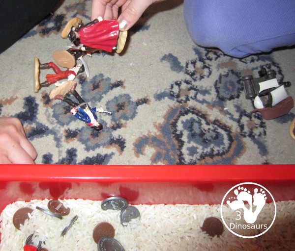 Pirate Sensory Bin - a sensory bin fill with pirate themes and coins for kids. Great for talk like a pirate day or a pirate theme- 3Dinosaurs.com